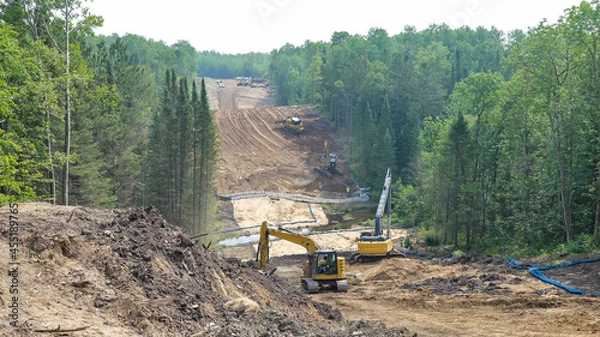 Obraz Line 3 Oil Pipeline construction site through forest land in Minnesota.