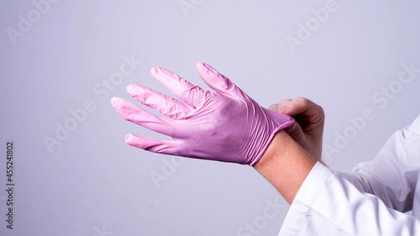 Obraz male hands in medical gloves