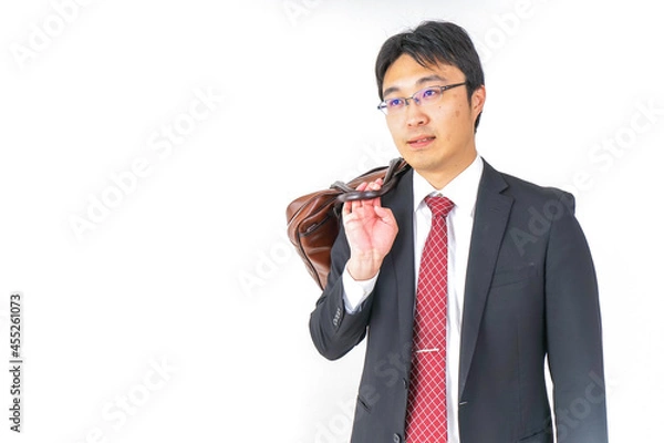 Fototapeta 家を掃除する若い女性