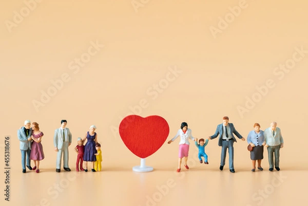 Obraz Miniature people Family Father Mother and Children standing near red heart with copy space happiness using for travel around the world business trip traveler adviser agency or valentine day special