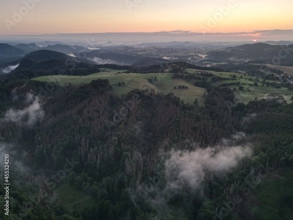 Obraz sunset over the clouds