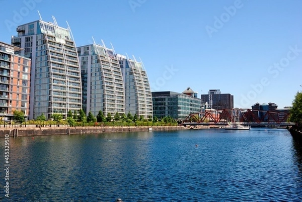 Obraz Curved residential buildings overlooking Huron Basin from the waterside of North Wharf in Greater Manchester, England, UK