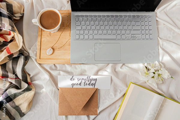 Fototapeta Modern home office desk with laptop, book, tea latte cup on messy bef background. Flat lay, top view. Autumn, fall concept.
