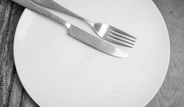 Obraz Dinner plate with knife and fork 