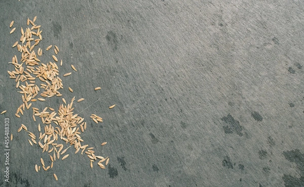 Obraz Cumin Seeds on Black Slate Tile