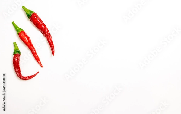 Obraz Chilli Peppers on White Background