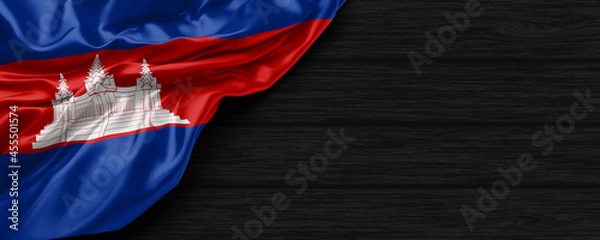 Obraz Close Up of Cambodia flag on the black wooden background 3D render