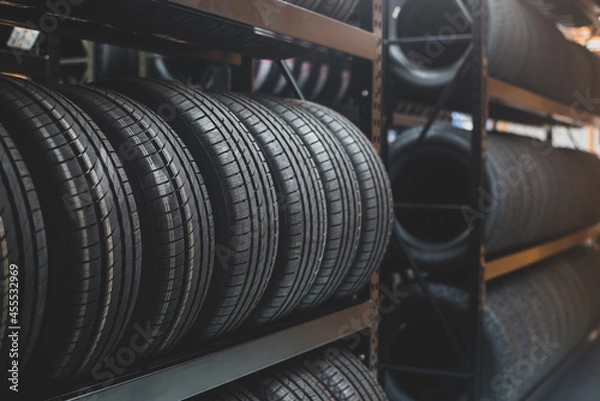 Fototapeta A new tire is placed on the tire storage rack in the tire factory. Be prepared for vehicles that need to change tires.