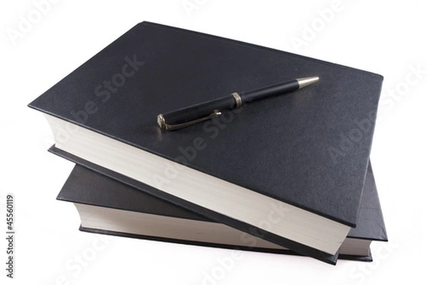 Fototapeta Libros y bolígrafo