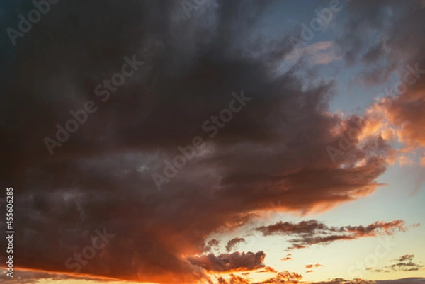 Fototapeta Amazing cloudscape on the sky at sunset time.