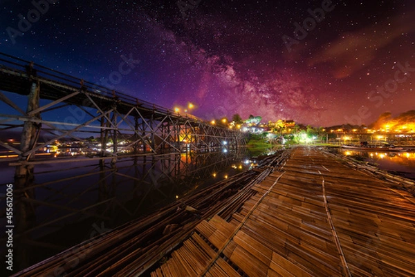 Fototapeta Scenery of milkyway at the middle of the night over . ( Visible noise due to high ISO, soft focus, shallow DOF, slight motion blur due to long exposure shot)