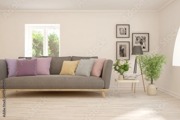 Fototapeta Stylish room in white color with sofa and summer landscape in window. Scandinavian interior design. 3D illustration