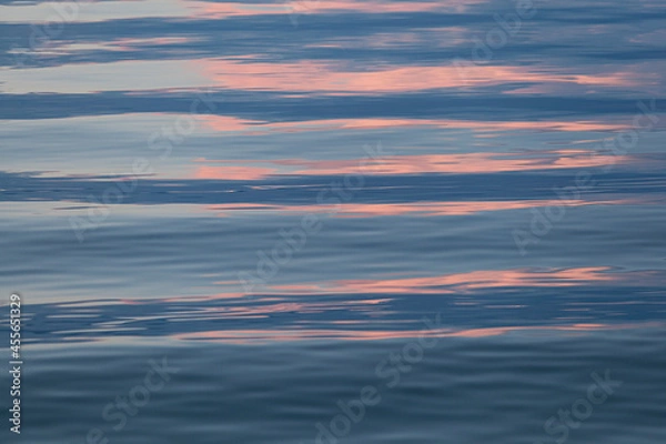 Obraz blue and pink reflection in the water, metallic blue water, abstract background