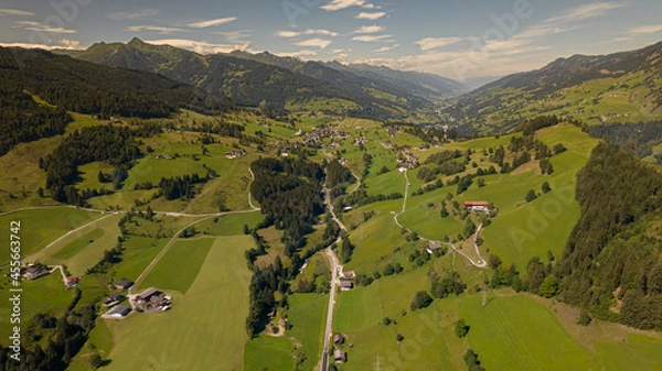 Obraz View of the mountains in Austria. Sunset with colorful clouds. Snowy mountains in Austria.