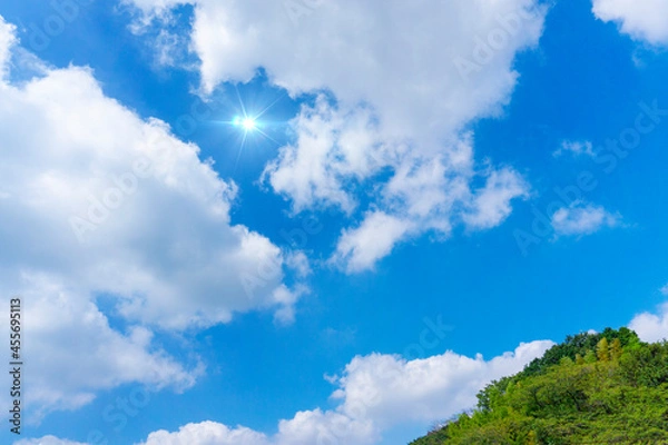 Fototapeta 太陽の日差しと爽やかな青空と雲の背景素材_e_11