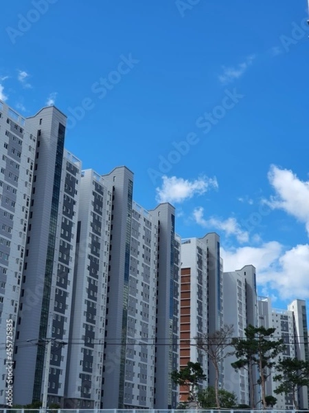 Fototapeta Architecture, sky and architecture. Background, clouds., sunny weather