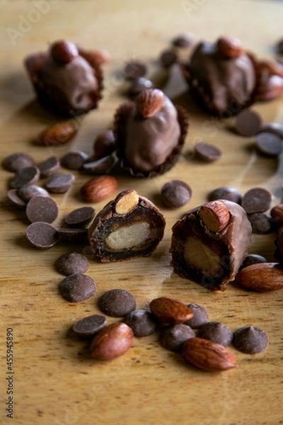 Obraz dates covered with chocolate and stuffed with marzipan 