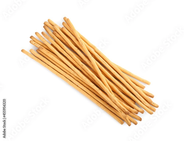 Obraz Delicious grissini sticks on white background, top view