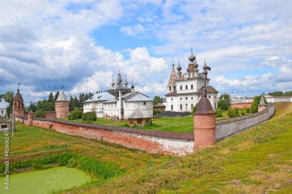 Fototapeta The Mikhailo-Arkhangelsk Monastery in Yuriev-Polsky was founded at the beginning of the XIII century by Prince Svyatoslav. The existing temples belong to the XVII century. Russia, Yuryev, August, 2021