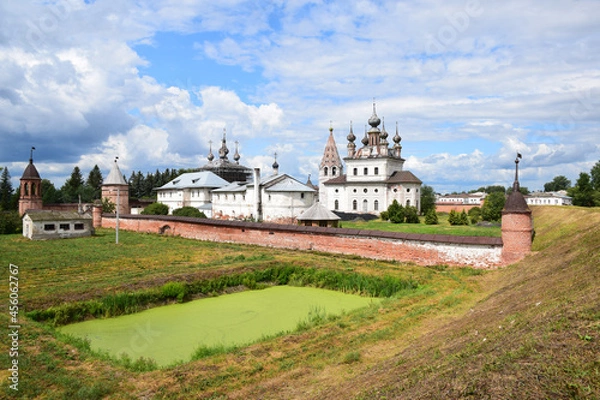 Fototapeta The Mikhailo-Arkhangelsk Monastery in Yuriev-Polsky was founded at the beginning of the XIII century by Prince Svyatoslav. The existing temples belong to the XVII century. Russia, Yuryev, August, 2021