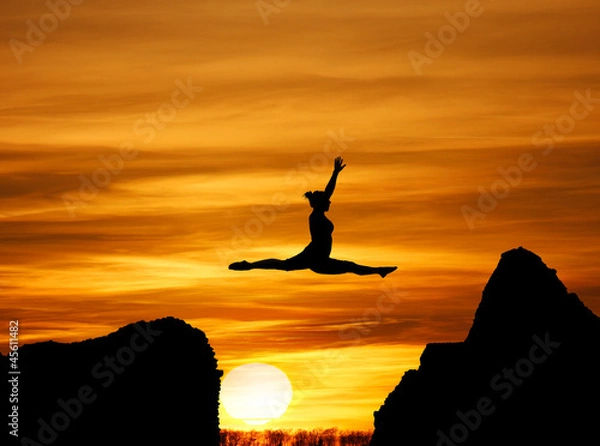 Obraz jumping a gap in sunset