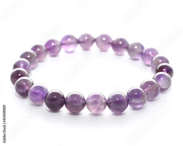 Obraz mineral bracelet, bracelet jewelry made of different types of round gemstone beads. Amethyst