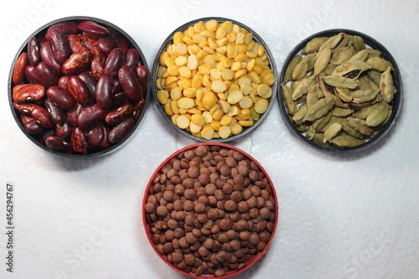 Fototapeta Cereals and spices on white background with copy space