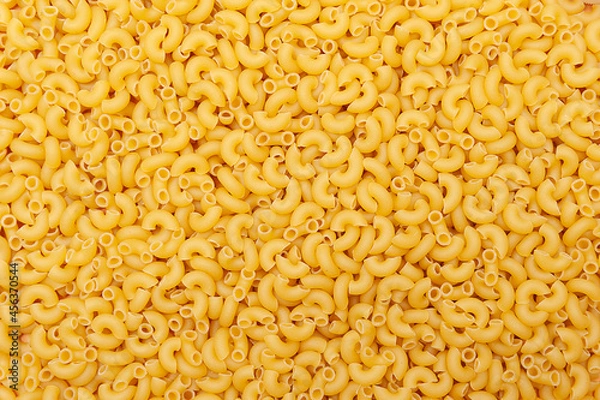 Obraz Background of raw pasta Elbow macaroni