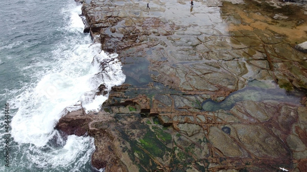 Obraz water flowing over rocks