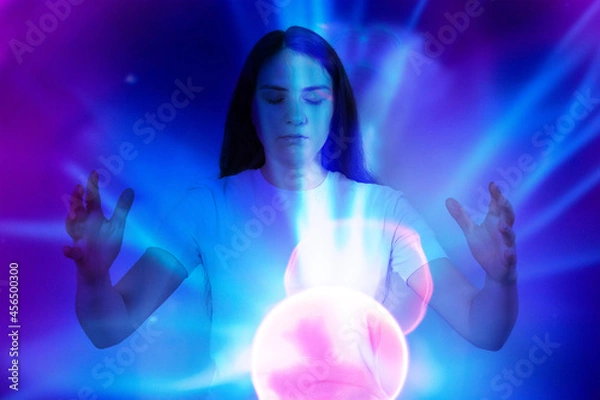 Fototapeta Human and quantum physics - lines, balls in blue and pink shades. Concentration, wish-making, quantum psychology