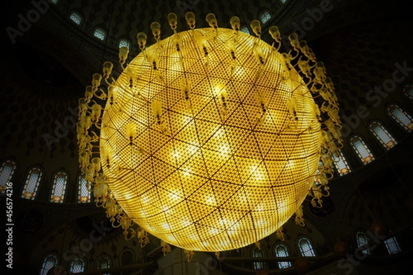 Obraz Close view of the globe chandelier inside the mosque.