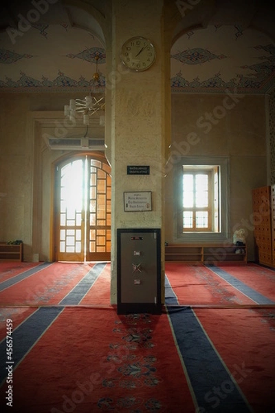 Obraz Front view of the money box in front of the wall, column inside the mosque.
