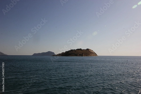 Obraz An island in the middle of the sea, beach with island view.