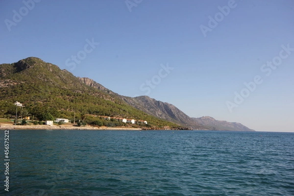 Obraz Distant view of the beach on the mountainside, mountain and coast view.