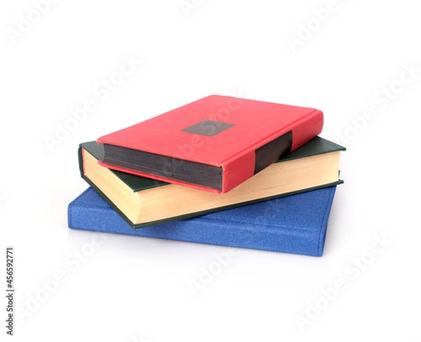 Obraz Stack of books in colour covers isolated on a white background