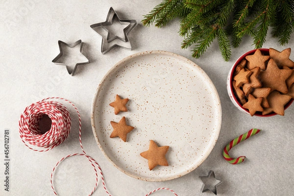 Fototapeta Christmas gingerbread cookies on the plate. Snowflake
