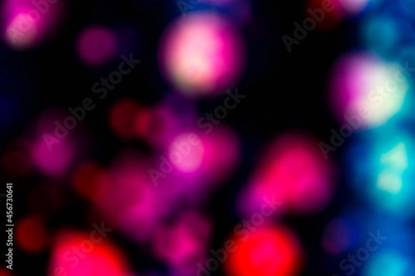 Fototapeta Blurred bubbles on black background