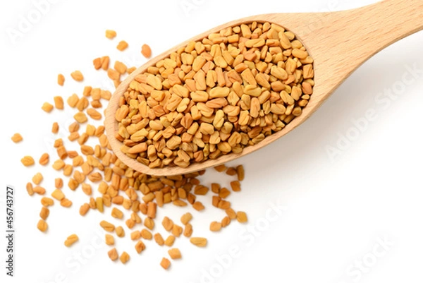 Fototapeta raw fenugreek seeds isolated on white, top view
