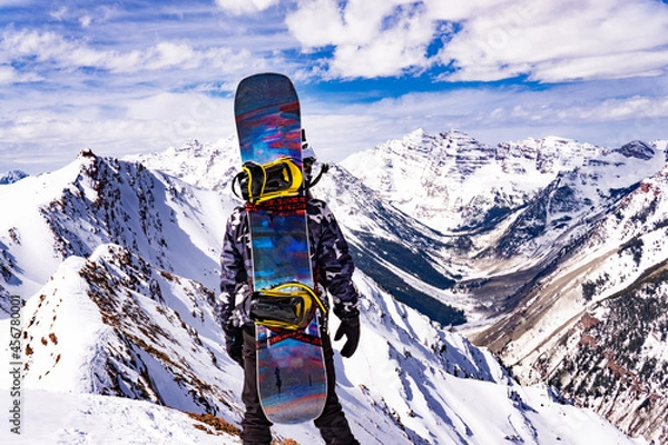Obraz Snowboarder On Epic Mountain Summit Peak In Snow