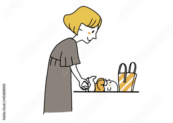 Fototapeta 外出先で赤ちゃんのオムツを変えている女性