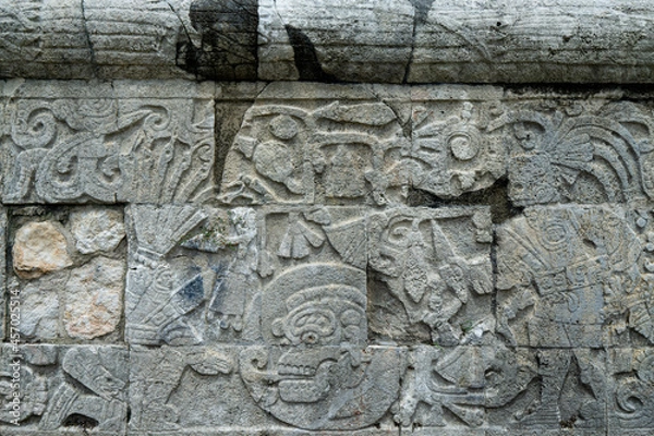 Fototapeta Ancient stone wall in Chichen Itza, Mexico