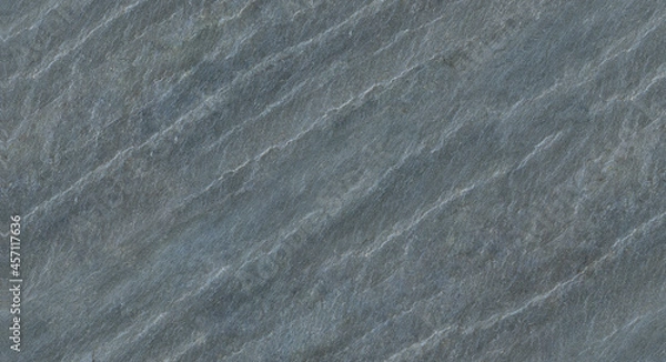 Fototapeta The texture of the stone wall. Close-up. Light gray rock backdrop