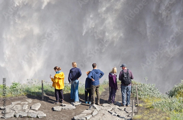 Fototapeta Iceland - August 3, 2021: Tourists at Dettifoss. The waterfall is situated in Vatnajökull National Park in Northeast Iceland, and is reputed to be the most powerful waterfall in Europe