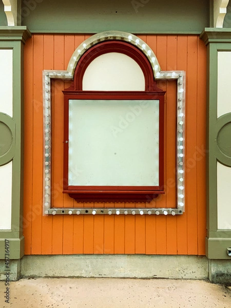 Obraz Empty sign on old theater, surrounded by lights, some broken. Room for copy space on sign.  