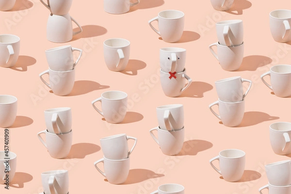 Fototapeta Creative pattern of cups on pastel pink background. Minimal concept. Isometric.