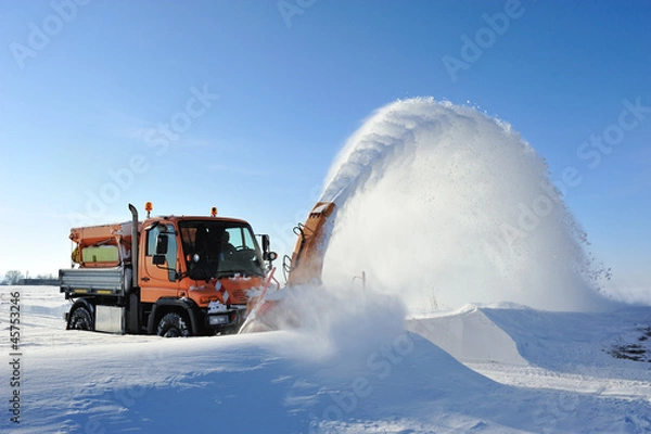 Fototapeta snow blow cleaning road