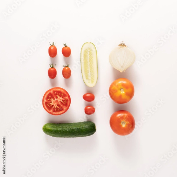 Obraz Fresh colorful vegetables. Top view, flat lay, creative concept. Tomato, cucamber, onion.