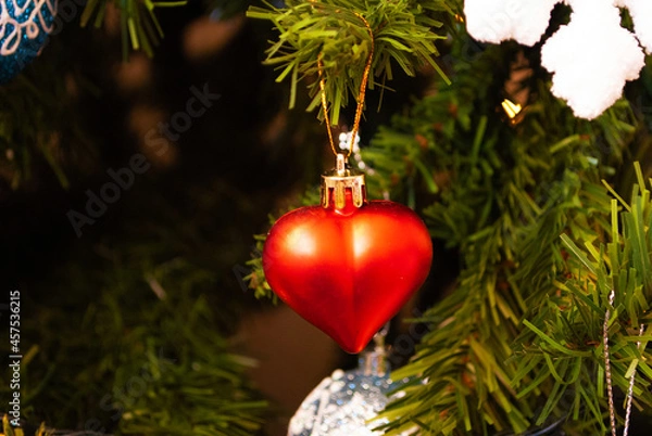 Fototapeta christmas decor, toys, bows, glass balls, bokeh, background, toys, merry christmas, happy new year. 2022. Lights, sparkles and glare, snow. 