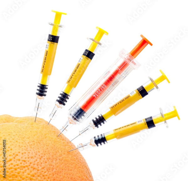 Obraz Syringes and orange.