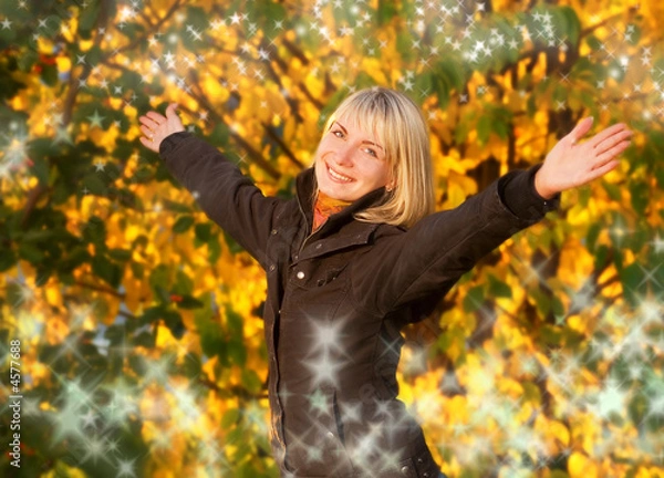Fototapeta Happy young girl over abstract autumn background